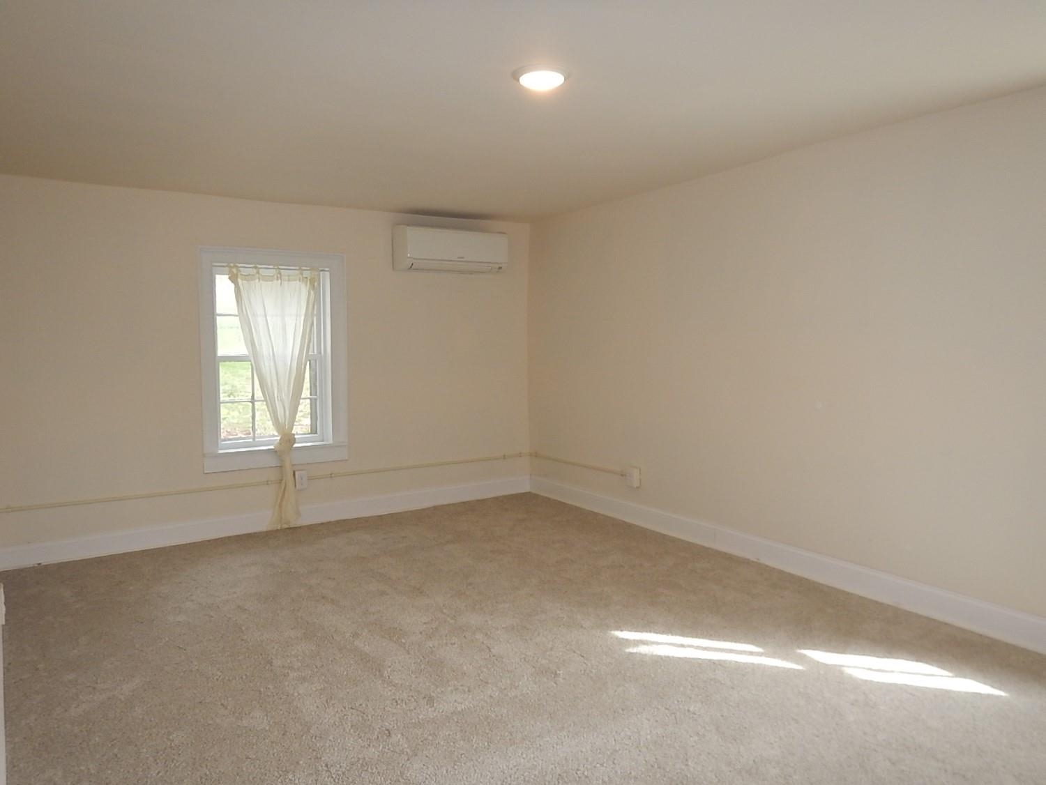 3653 Middlebrook Village Road Middlebrook, VA 24459 - Photo 12 of 48 an empty room with a window