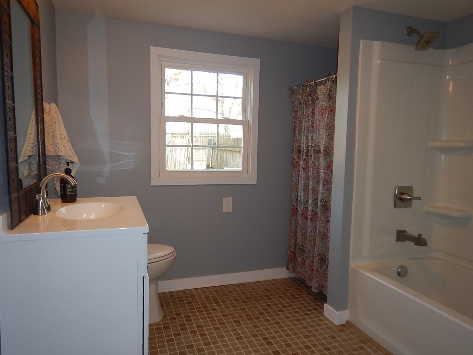 3653 Middlebrook Village Road Middlebrook, VA 24459 - Photo 23 of 48 a bathroom with a sink a toilet and a bathtub