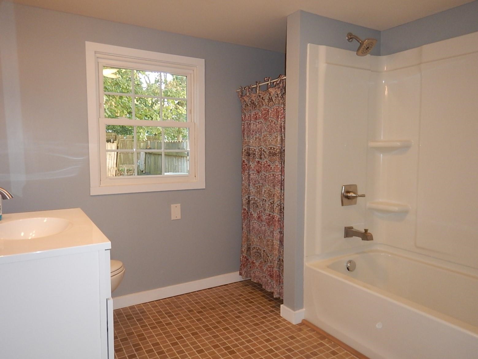 3653 Middlebrook Village Road Middlebrook, VA 24459 - Photo 32 of 48 a bathroom with a bathtub and shower