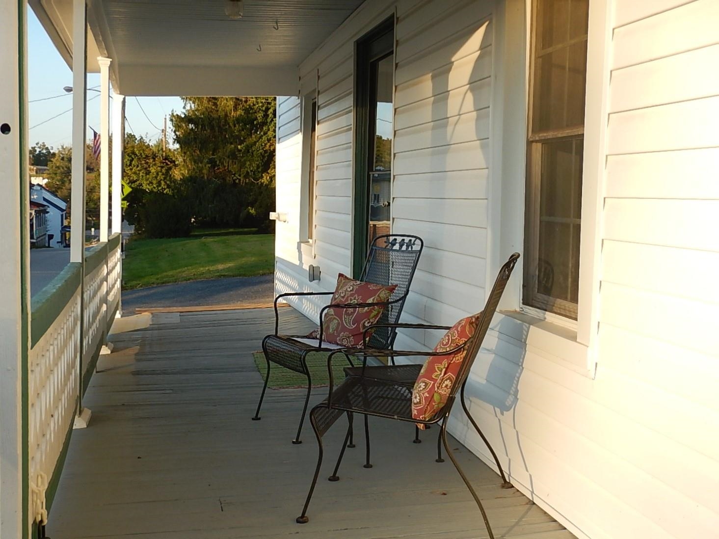 3653 Middlebrook Village Road Middlebrook, VA 24459 - Photo 44 of 48 a view of a porch with chairs and backyard