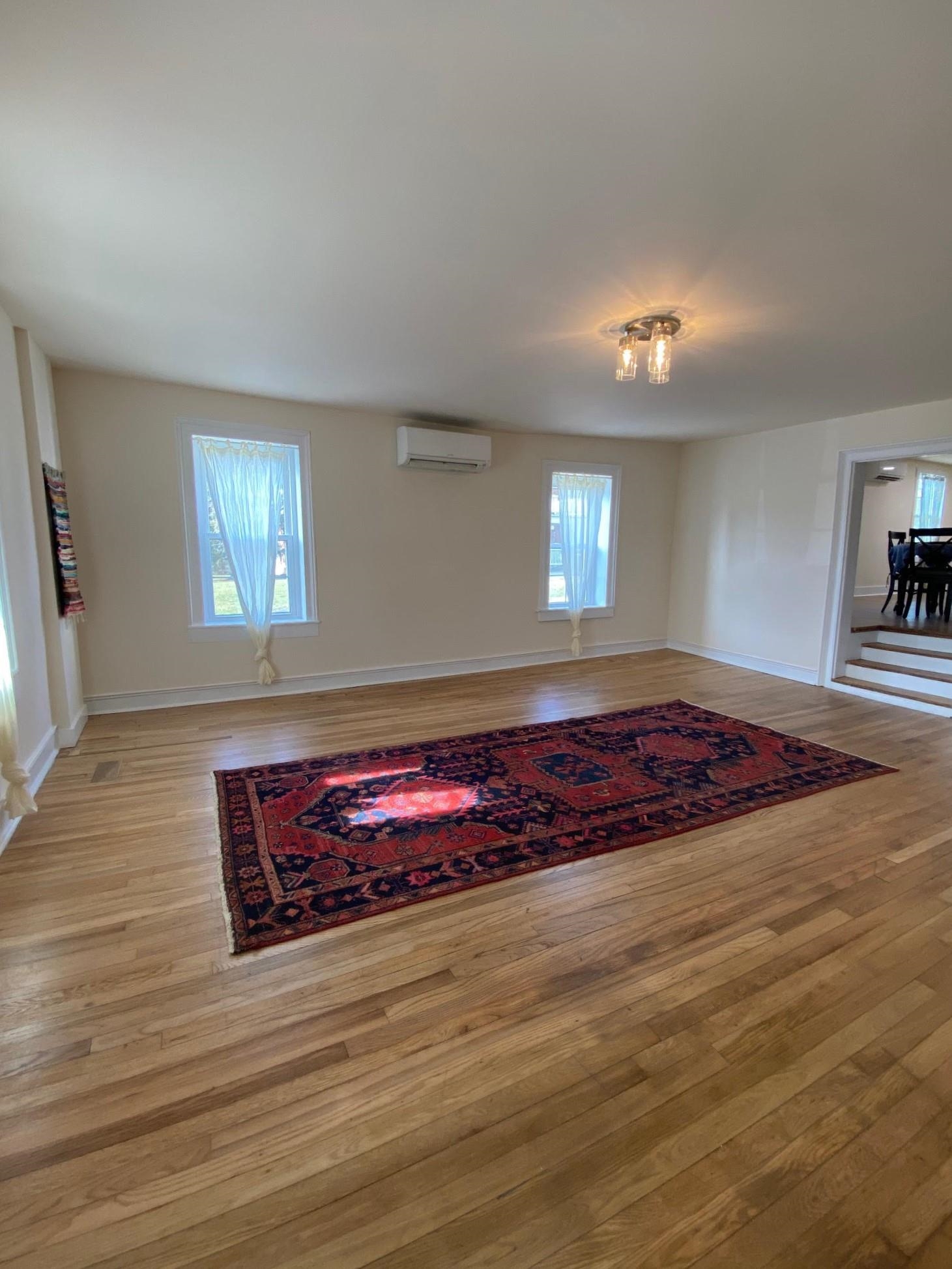 3653 Middlebrook Village Road Middlebrook, VA 24459 - Photo 6 of 48 an empty room with wooden floor and windows