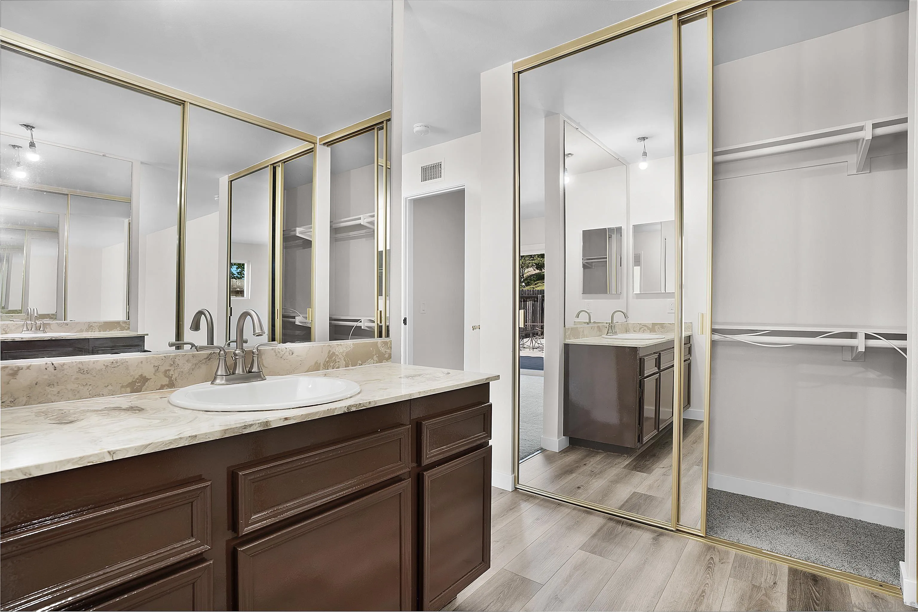 1454 Bathurst Place El Cajon, CA 92020 - Photo 31 of 35 a bathroom with a double vanity sink mirror and double