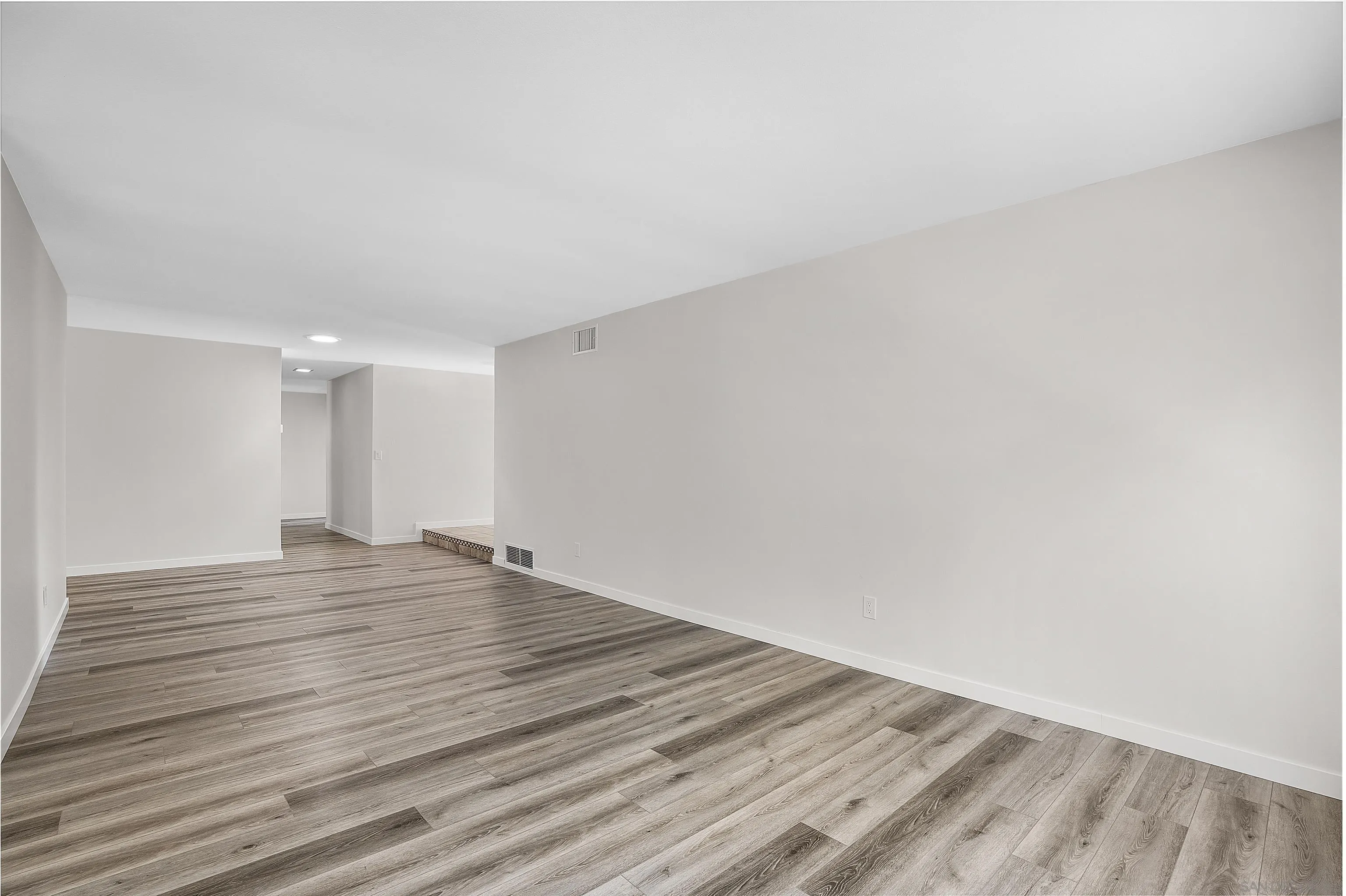 1454 Bathurst Place El Cajon, CA 92020 - Photo 8 of 35 a view of empty room with wooden floor