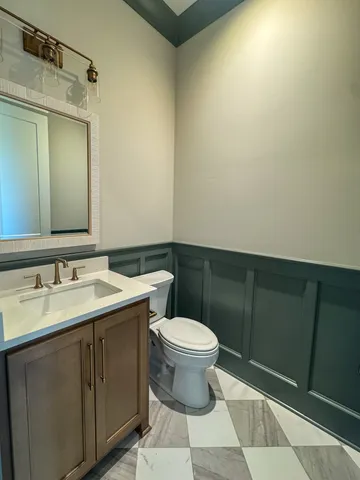 a bathroom with a sink and a toilet