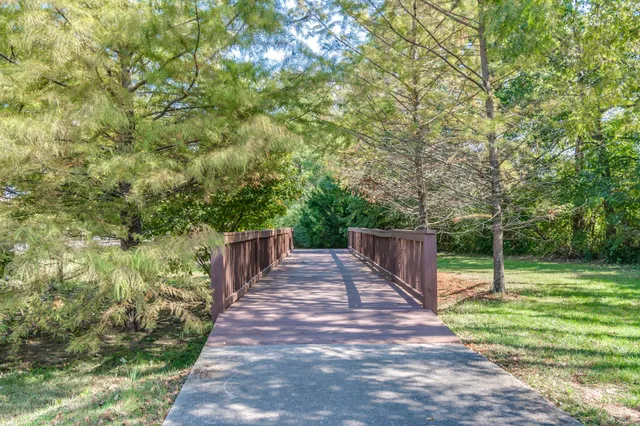 a sign on the side of a park