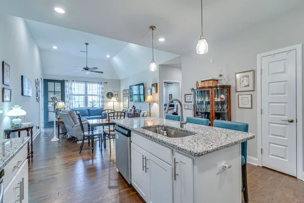 a view of a kitchen and dining table