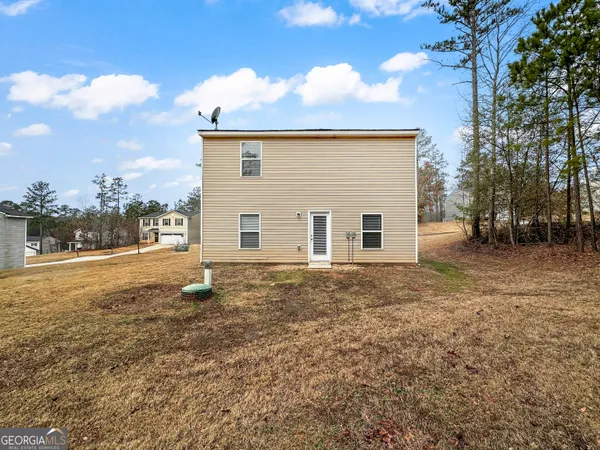 a view of backyard of house