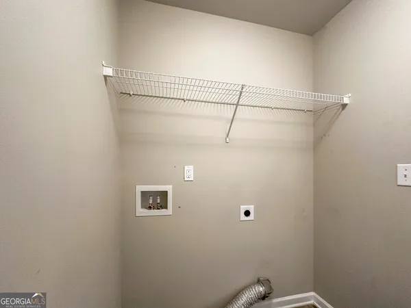 a view of a room with racks on the wall