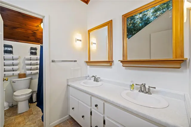 a bathroom with a tub and a shower