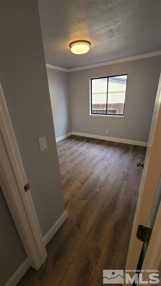 5880 Coyote Ridge Road Reno, NV 89523 - Photo 13 of 28 a view of a livingroom with wooden floor and window