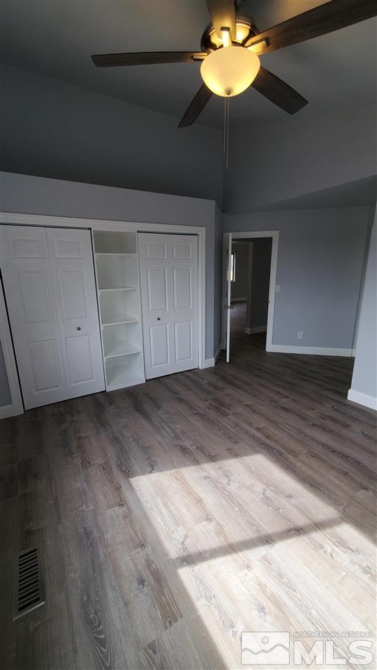 5880 Coyote Ridge Road Reno, NV 89523 - Photo 18 of 28 a view of a livingroom with a chandelier fan