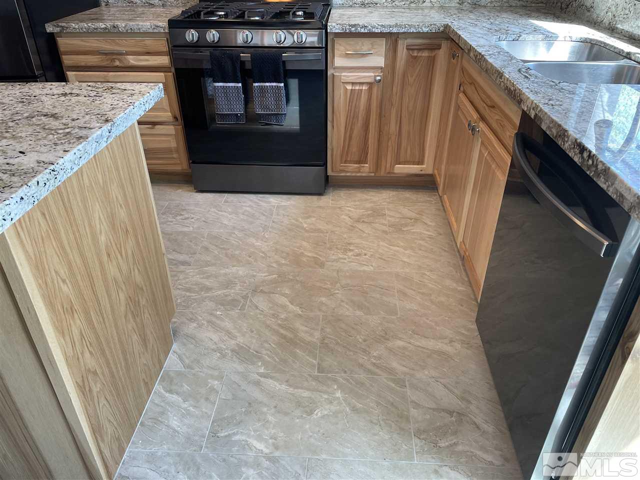 5880 Coyote Ridge Road Reno, NV 89523 - Photo 28 of 28 a view of kitchen and utility room