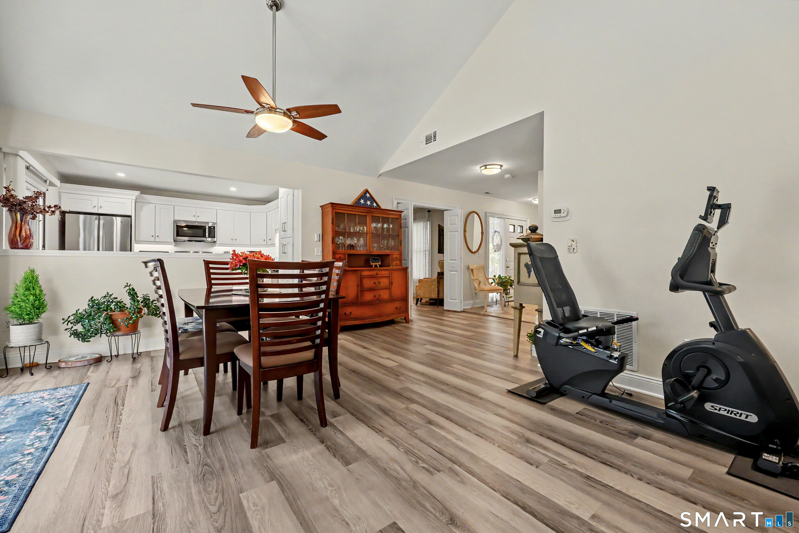 70 Fawn Ridge Lane, Unit 70 Norwalk, CT 06851 - Photo 7 of 36 a view of a room with gym equipment