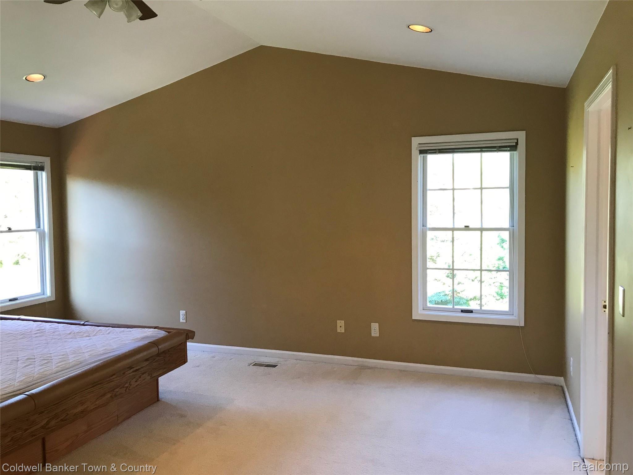 4400 Brighton Road Howell, MI 48843 - Photo 12 of 22 Master bedroom with vaulted ceiling