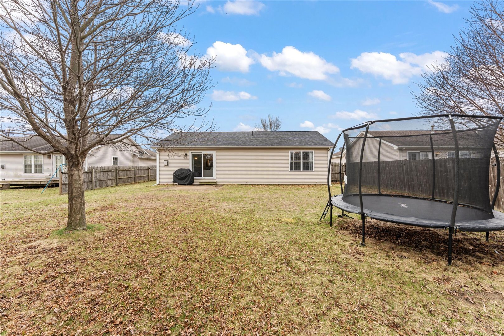 706 Northgate Drive St. Joseph, IL 61873 - Photo 25 of 33 a house view with a backyard space