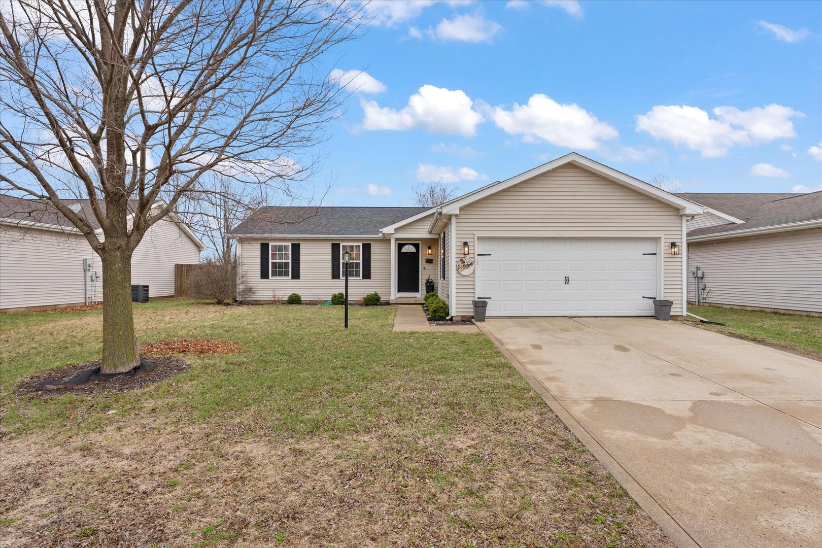 706 Northgate Drive St. Joseph, IL 61873 - Photo 28 of 33 front view of a house with a yard
