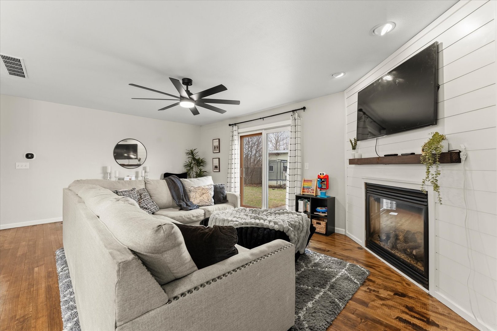 706 Northgate Drive St. Joseph, IL 61873 - Photo 7 of 33 a living room with furniture and a fireplace