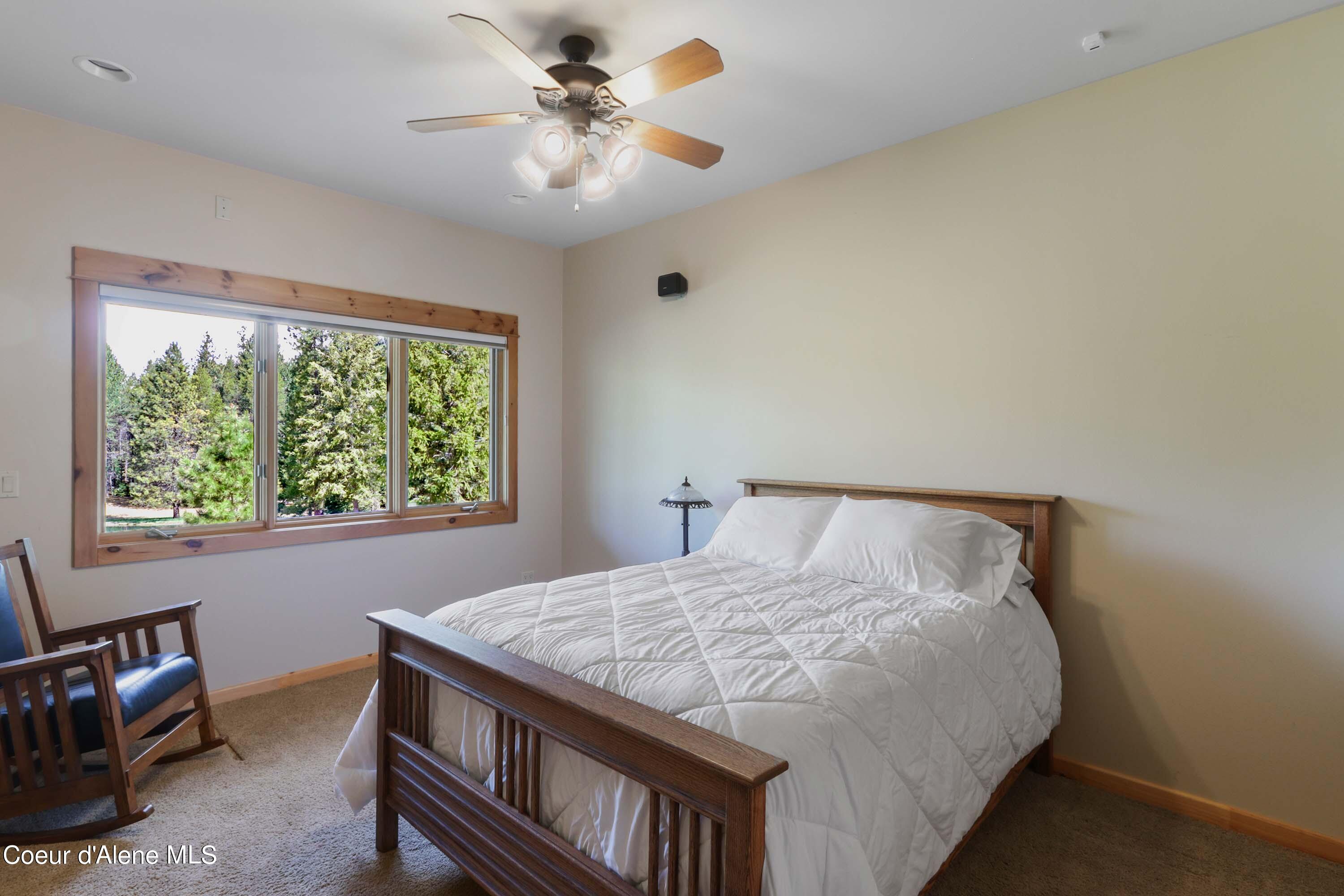 877 Heath Lake Road Sagle, ID 83860 - Photo 29 of 61 Downstairs Bedroom1