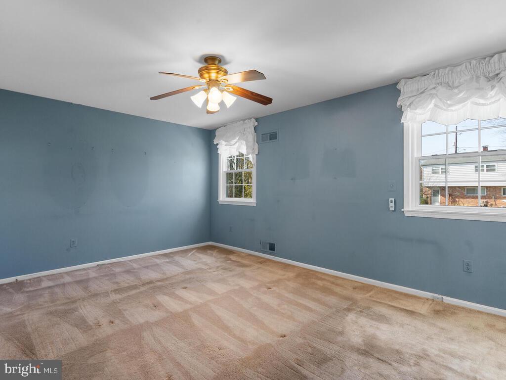 12714 Teaberry Road Silver Spring, MD 20906 - Photo 15 of 30 a view of an empty room with a window