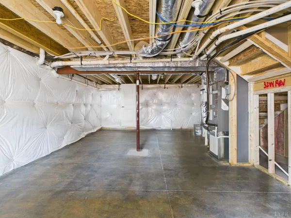 a view of a room with wooden walls