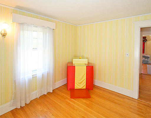 12 Lovell Road Watertown, MA 02472 - Photo 11 of 20 a bedroom with a bed and wooden floor