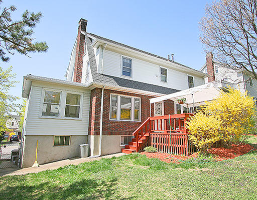 12 Lovell Road Watertown, MA 02472 - Photo 17 of 20 front view of a house with a yard