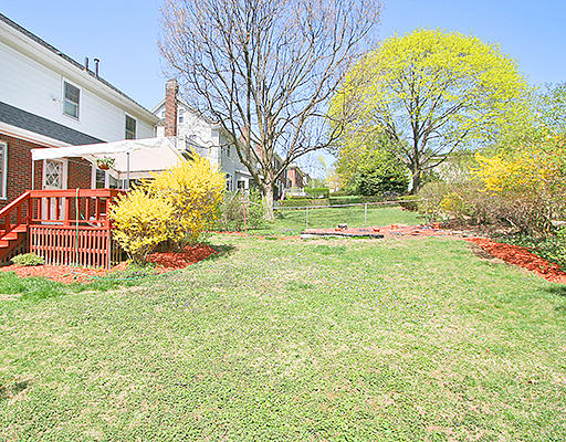 12 Lovell Road Watertown, MA 02472 - Photo 19 of 20 a view of a backyard with garden