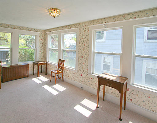 12 Lovell Road Watertown, MA 02472 - Photo 9 of 20 a living room with furniture and a window