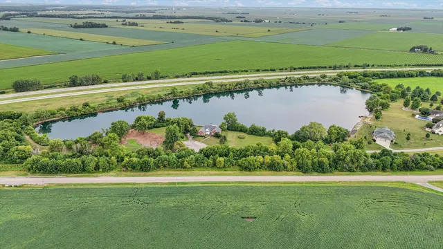 a view of a lake with a yard