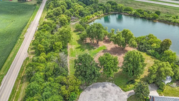 a view of a lake with a yard