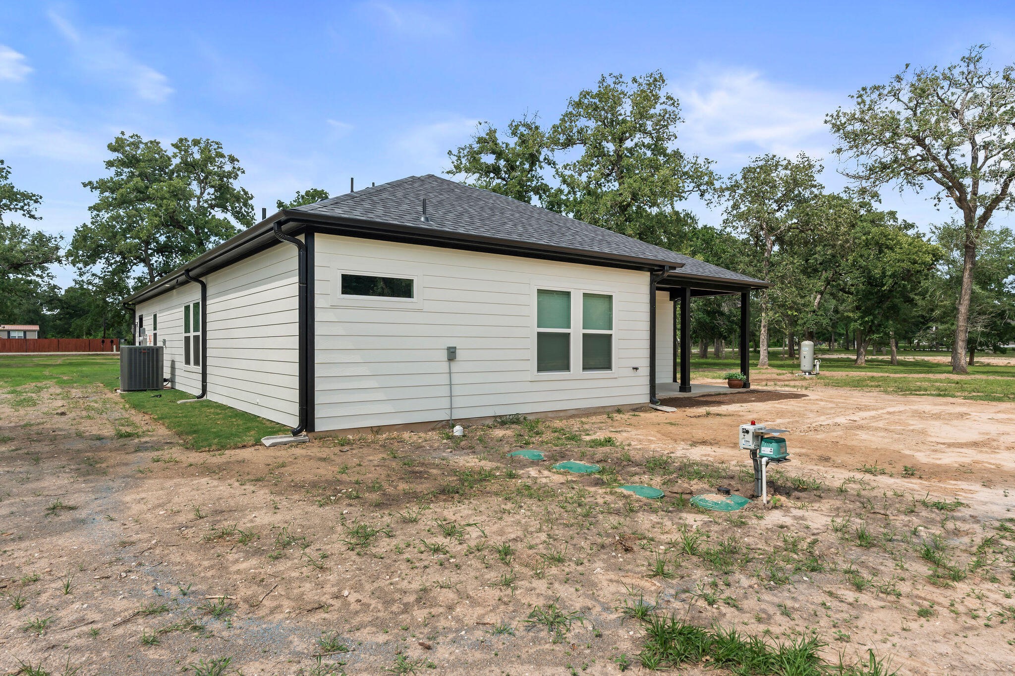 39645 Bosque Road Hempstead, TX 77445 - Photo 30 of 37 a front view of a house with a yard