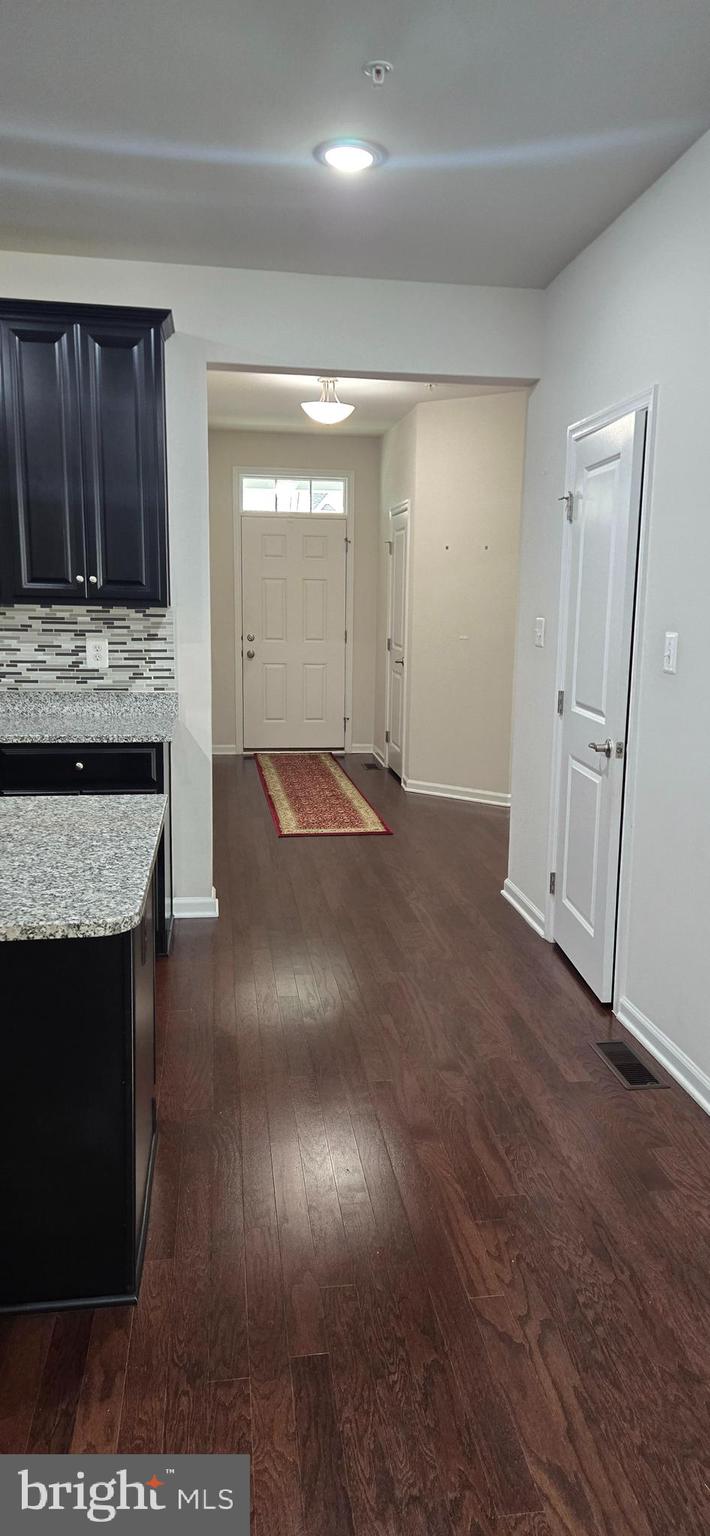 14164 Jaeger Road Clarksburg, MD 20871 - Photo 12 of 27 a view of kitchen with cabinets and wooden floor