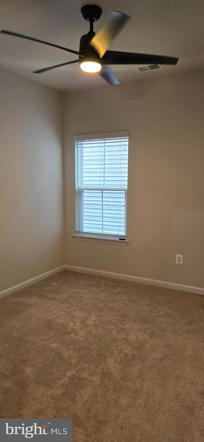 14164 Jaeger Road Clarksburg, MD 20871 - Photo 20 of 27 a view of an empty room with a window