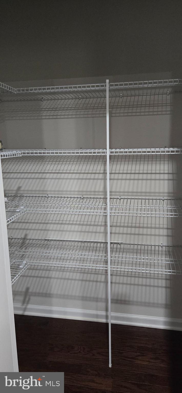 14164 Jaeger Road Clarksburg, MD 20871 - Photo 26 of 27 a view of a room with wooden floor