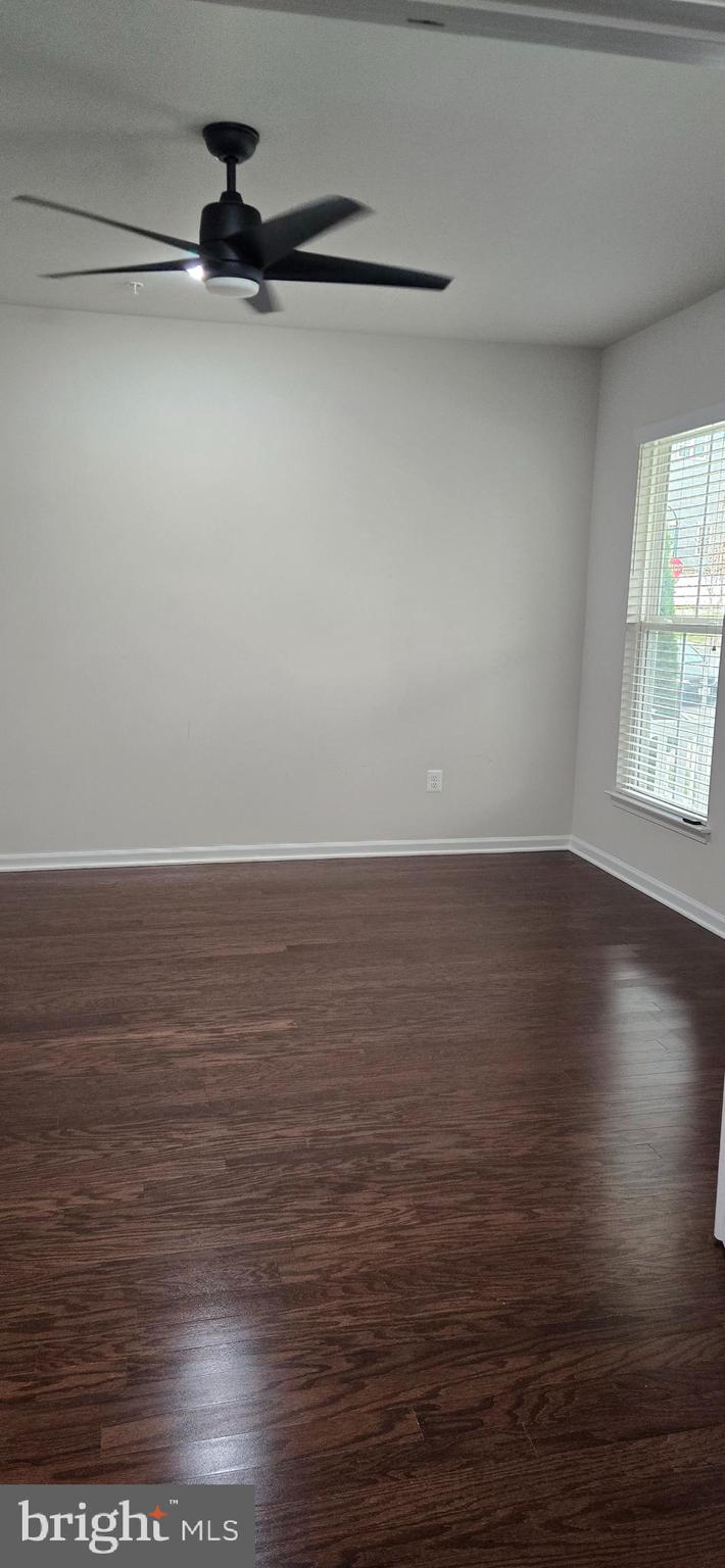 14164 Jaeger Road Clarksburg, MD 20871 - Photo 3 of 27 a view of a room with an empty space and wooden floor