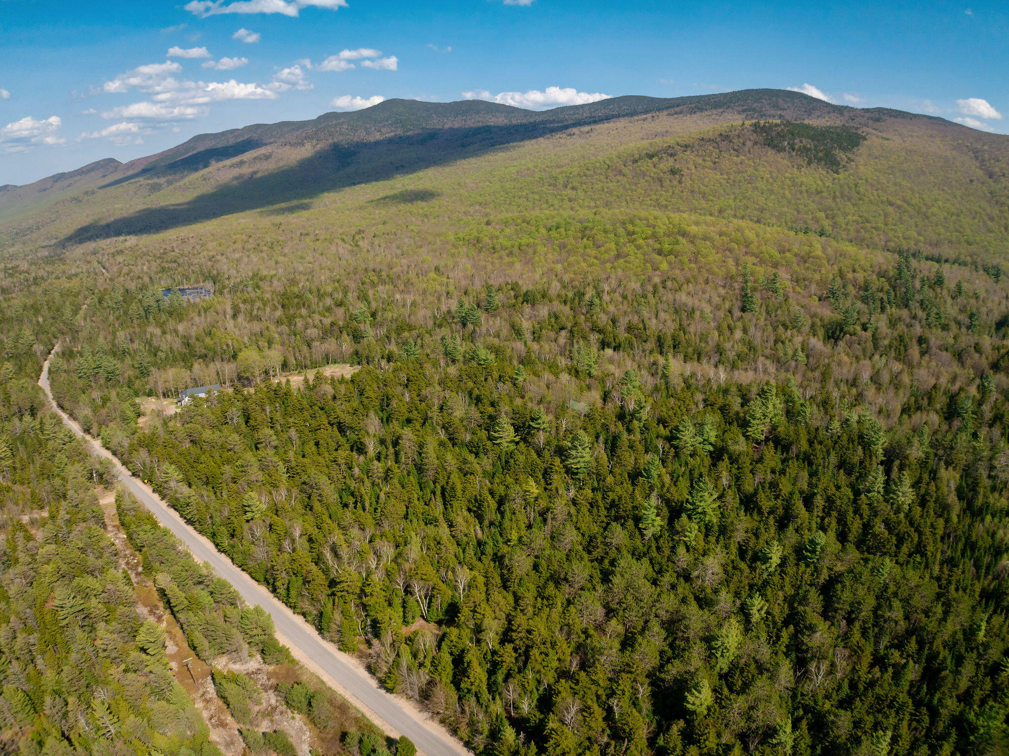 1147 Forestdale Road Au Sable Forks, NY 12912 - Photo 7 of 48 EXT-011_DJI_20260519035317_0766_D_edit