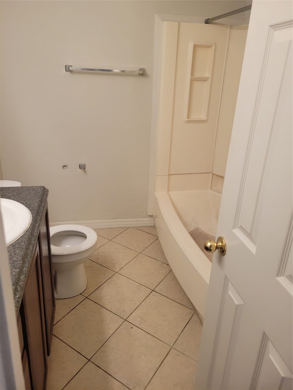 3435 Rosedale Street Houston, TX 77004 - Photo 25 of 34 a bathroom with a granite countertop sink toilet and shower