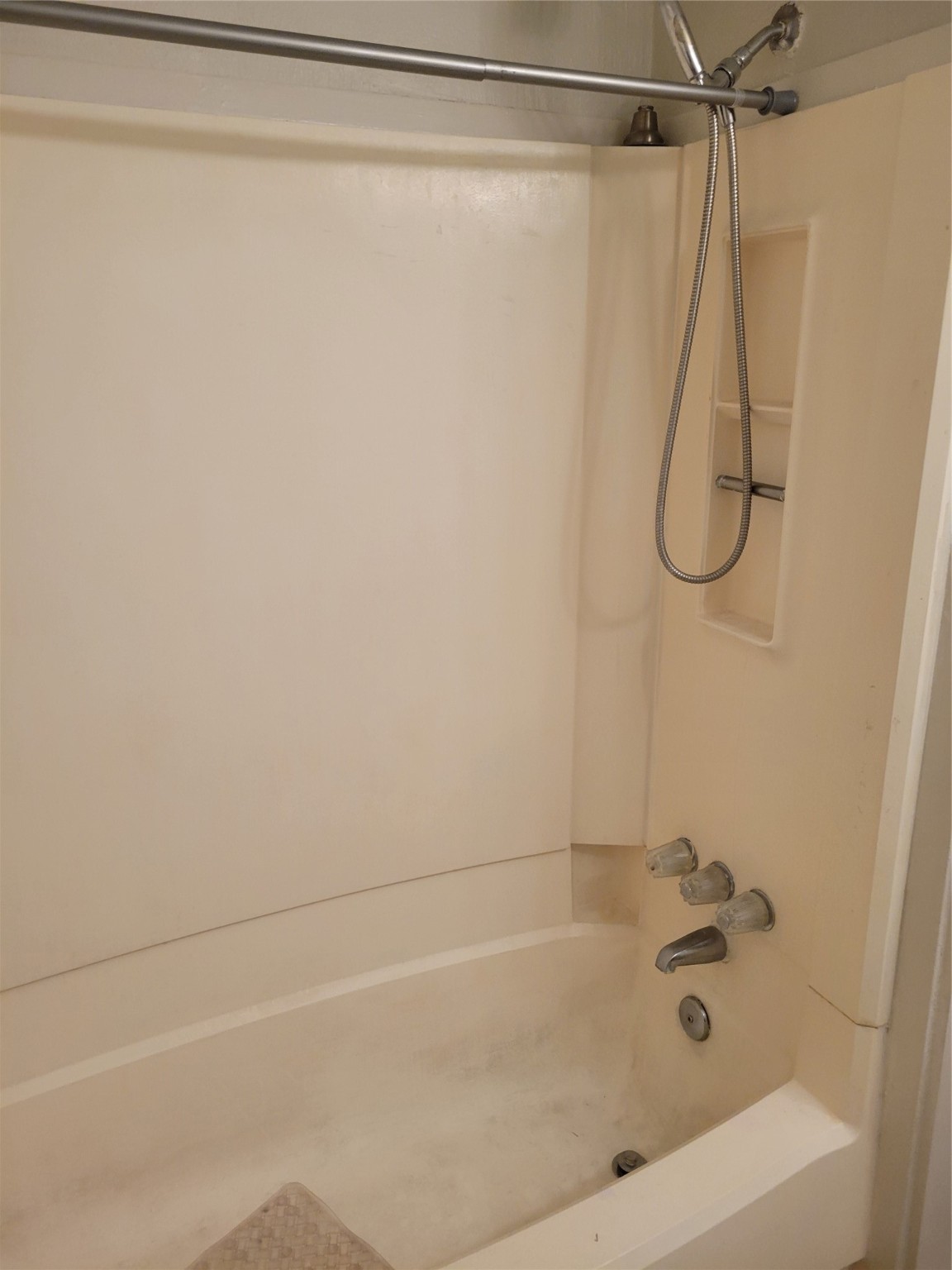 3435 Rosedale Street Houston, TX 77004 - Photo 27 of 34 a bathroom with a bath tub and a shower