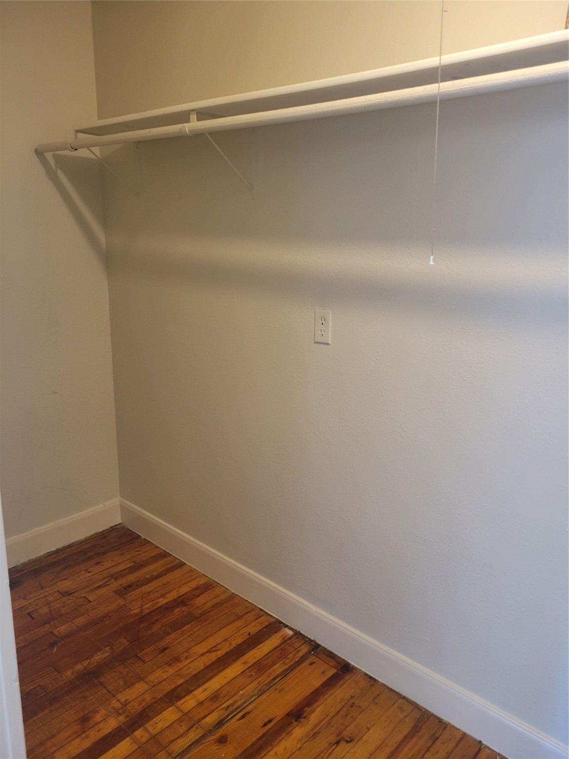 3435 Rosedale Street Houston, TX 77004 - Photo 28 of 34 a view of a room with wooden floor