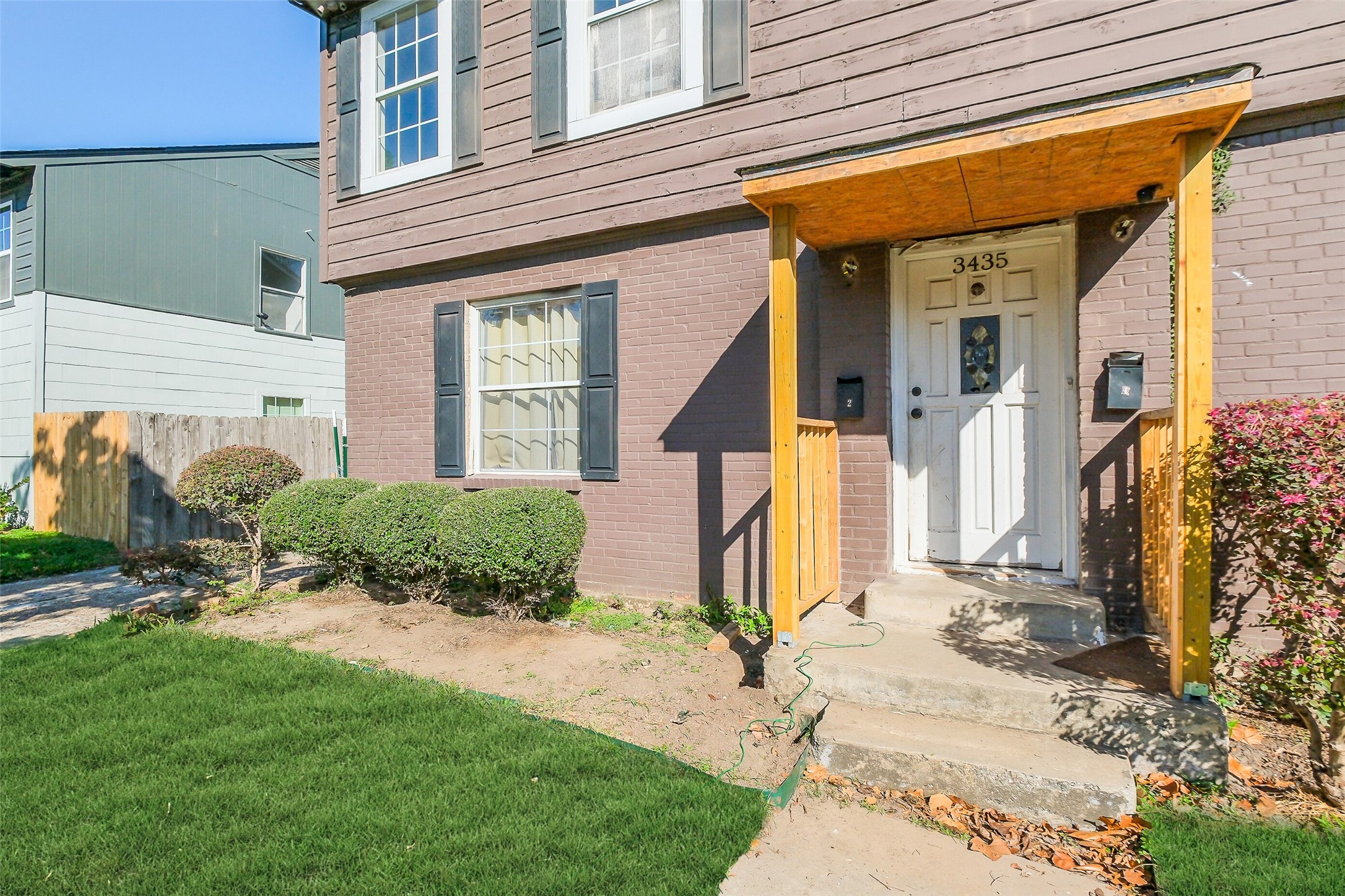 3435 Rosedale Street Houston, TX 77004 - Photo 6 of 34 a front view of a house with a yard