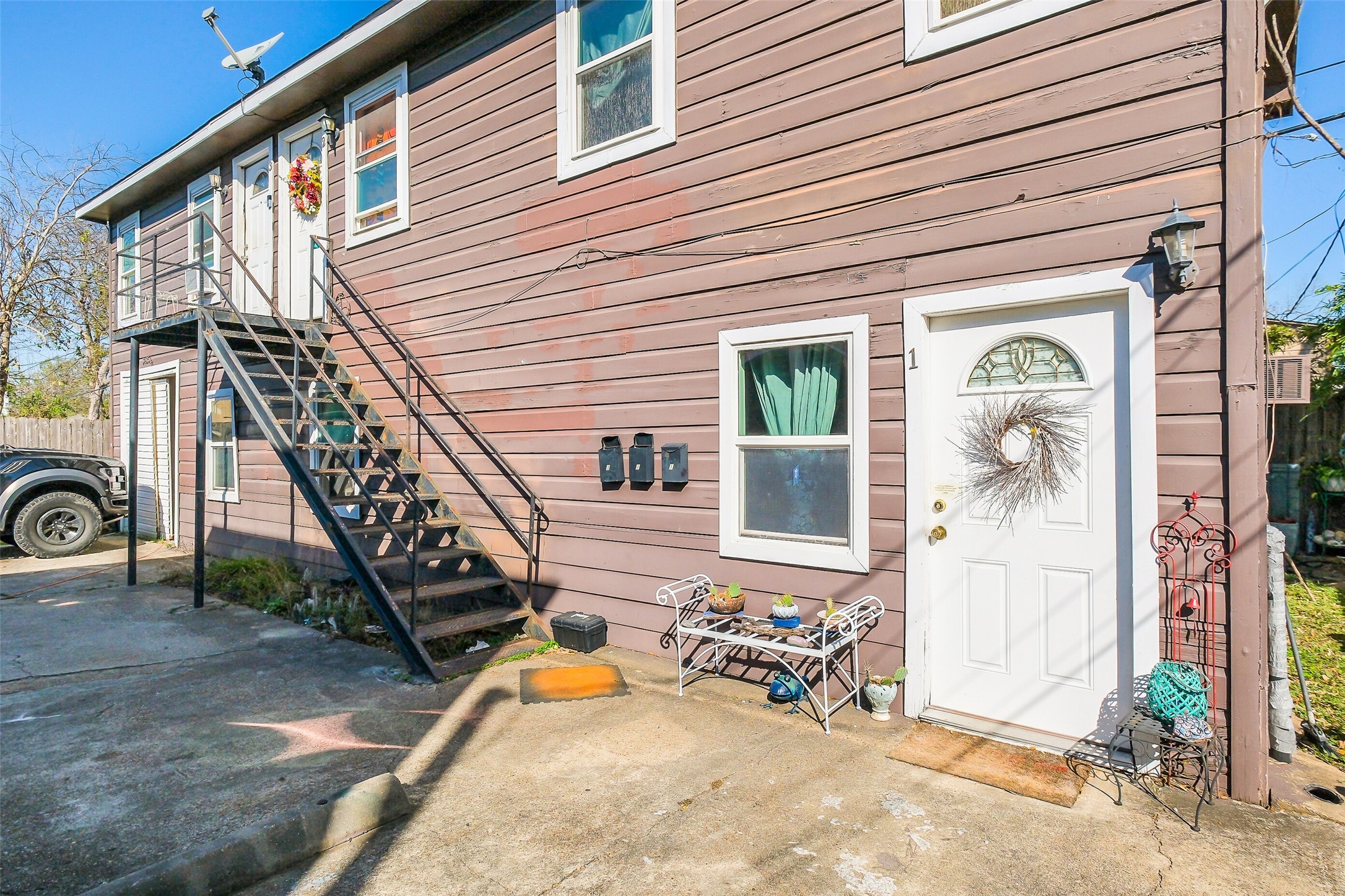 3435 Rosedale Street Houston, TX 77004 - Photo 10 of 34 a view of a balcony with furniture and floor to ceiling window