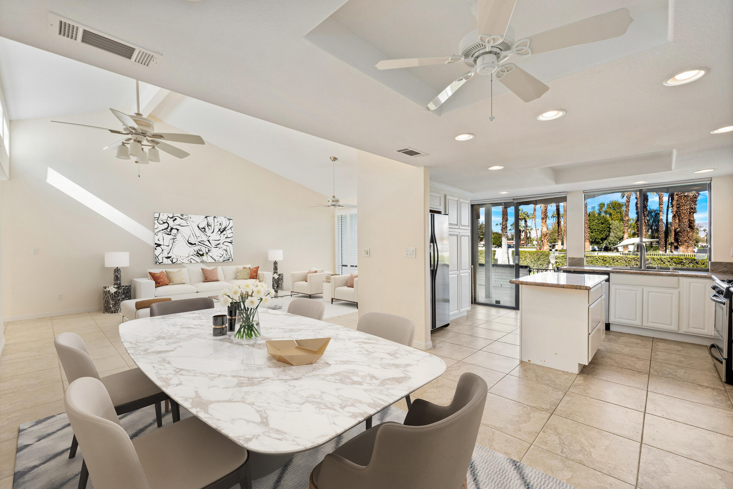 70 Durango Circle Rancho Mirage, CA 92270 - Photo 12 of 39 a view of a dining room with furniture and chandelier