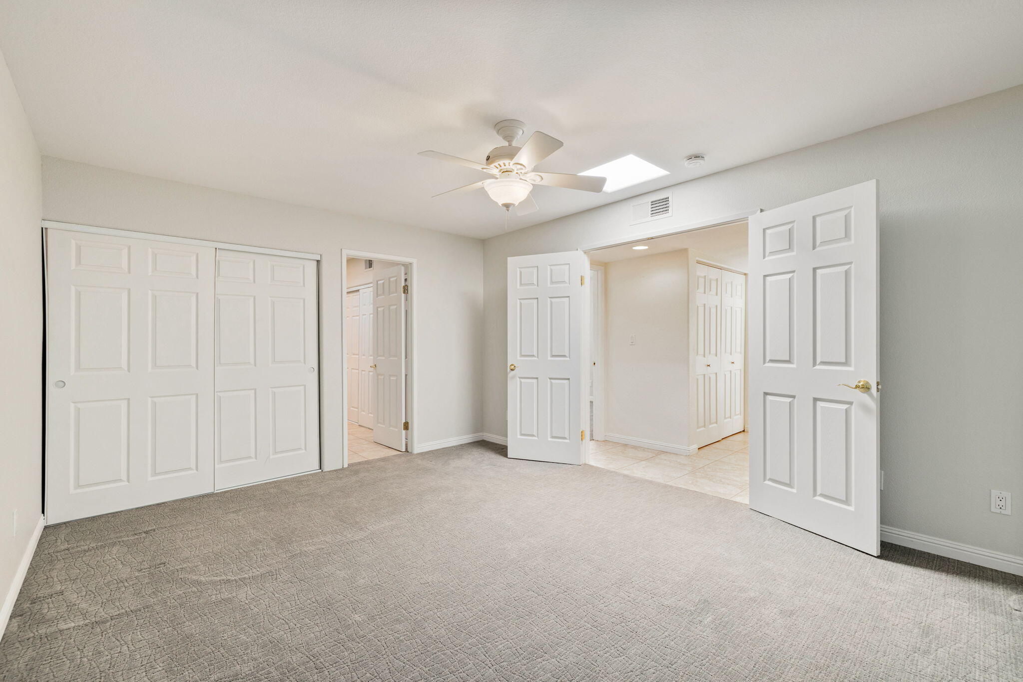 70 Durango Circle Rancho Mirage, CA 92270 - Photo 20 of 39 a view of an empty room with a ceiling fan