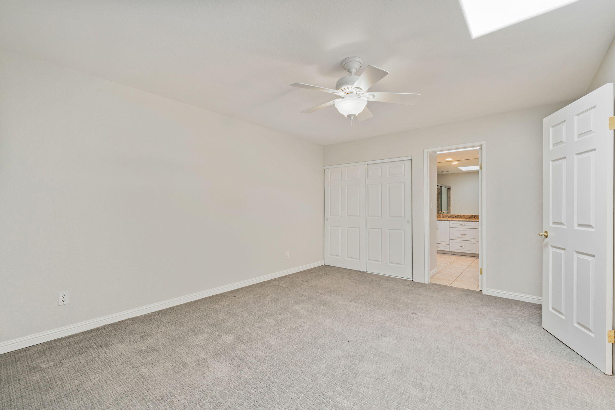 70 Durango Circle Rancho Mirage, CA 92270 - Photo 21 of 39 a view of an empty room with a fan