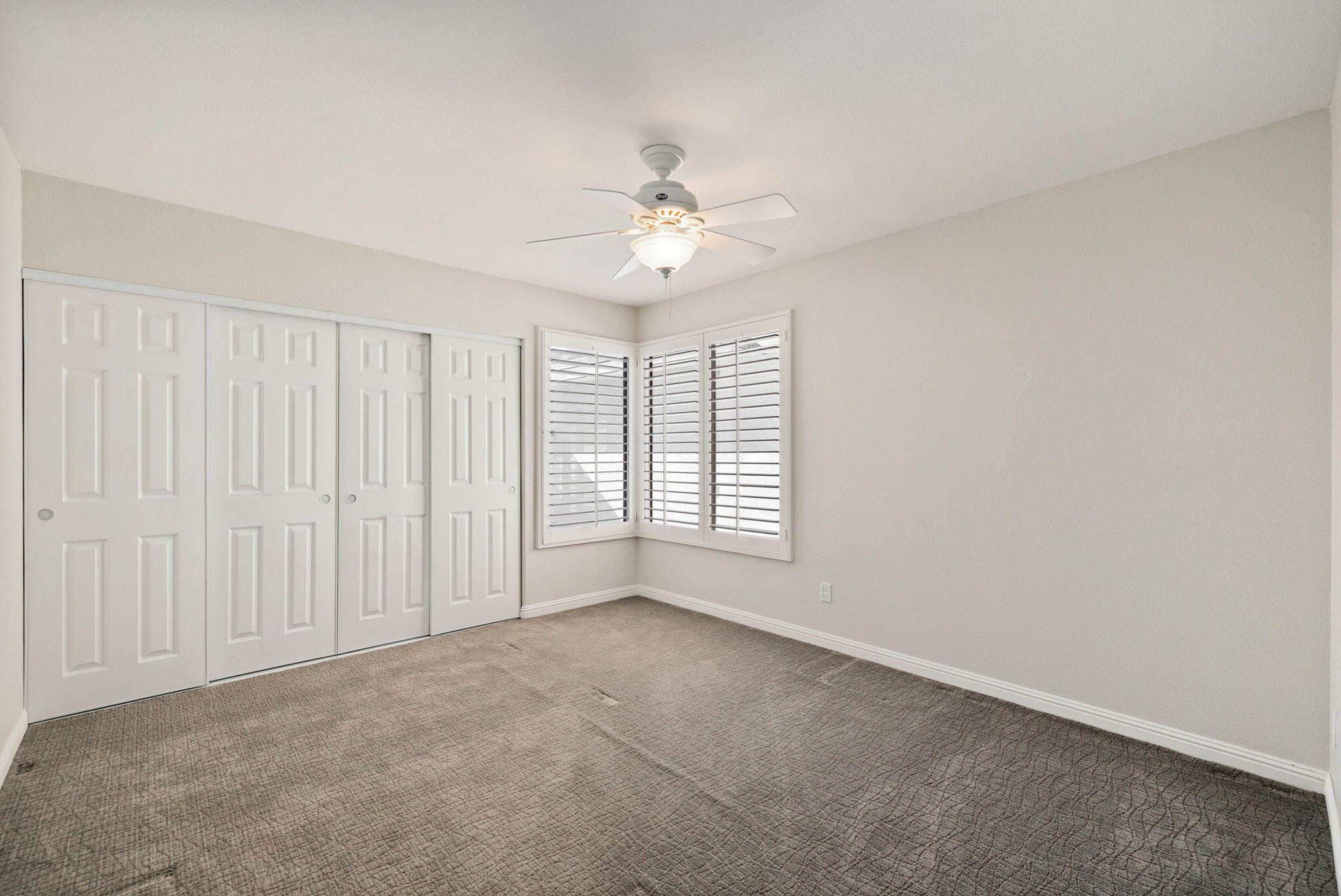 70 Durango Circle Rancho Mirage, CA 92270 - Photo 23 of 39 a view of an empty room with a window