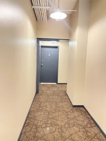 a view of a chair in backyard of the house