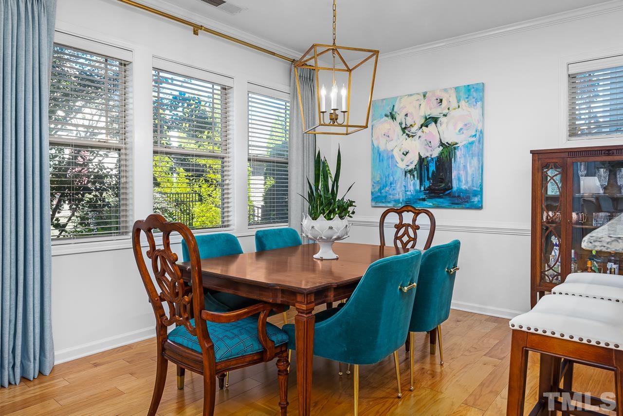 5528 Wade Park Boulevard Raleigh, NC 27607 - Photo 14 of 30 a view of a dining room with furniture window and outside view