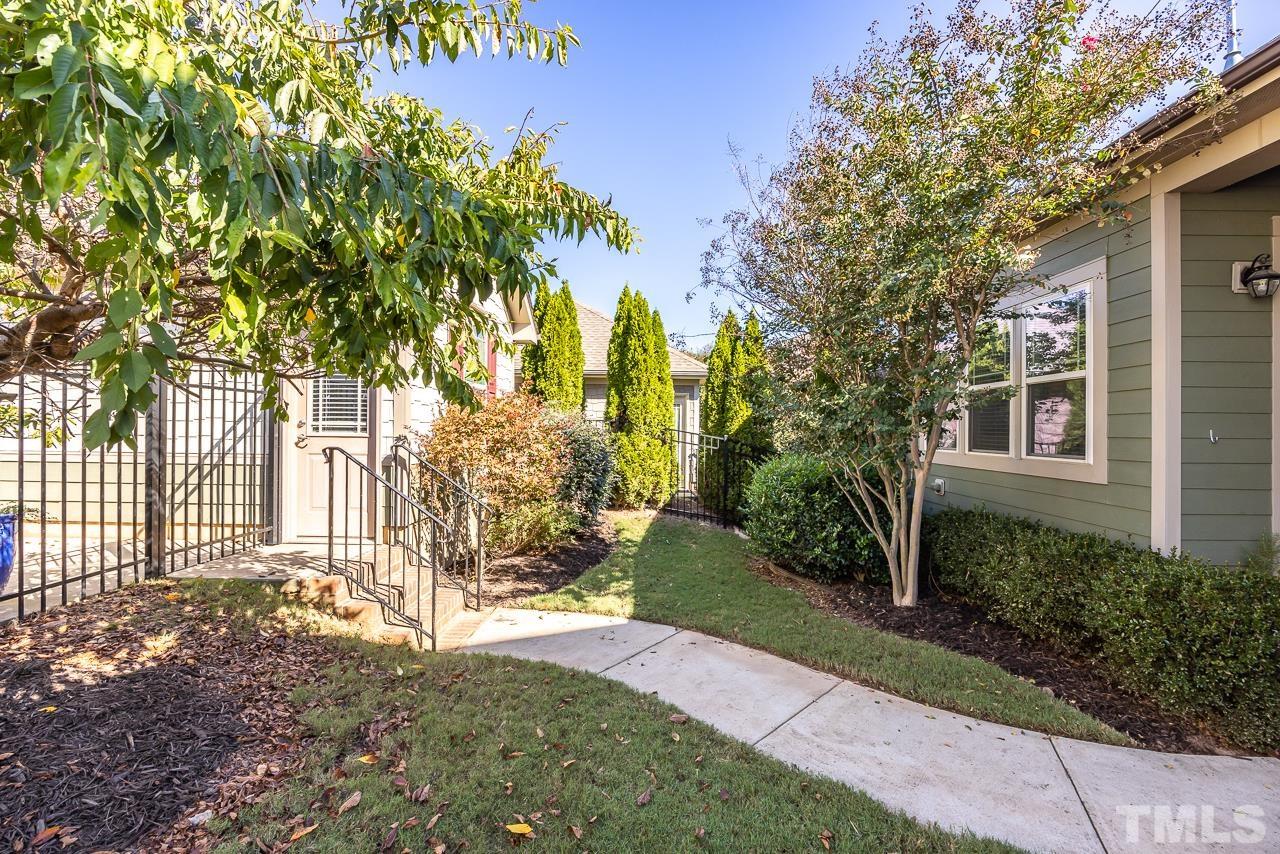 5528 Wade Park Boulevard Raleigh, NC 27607 - Photo 29 of 30 a view of a yard with plants and trees