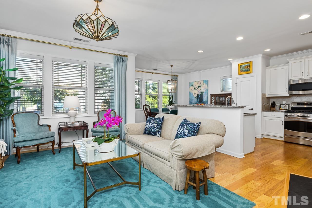 5528 Wade Park Boulevard Raleigh, NC 27607 - Photo 5 of 30 a living room with furniture and a large window