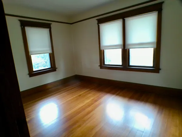 a view of a entryway door with wooden floor
